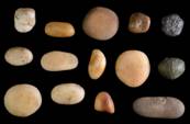  Colored quartz pebbles. (credit: CLARA AMIT/ISRAEL ANTIQUITIES AUTHORITY)